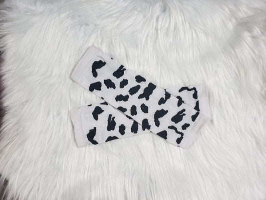 Cow print leg warmers